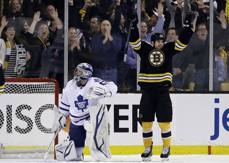 Nathan Horton of the Boston Bruins celebrates his first-period goal Wednesday night, starting his team to a 4-1 victory against the Toronto Maple Leafs in their playoff opener. The Toronto goalie is James Reimer.
