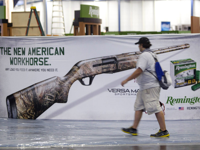 Exhibitors prepare for the annual National Rifle Association meetings in Houston on Wednesday. The event features a variety of political figures speaking on Friday.