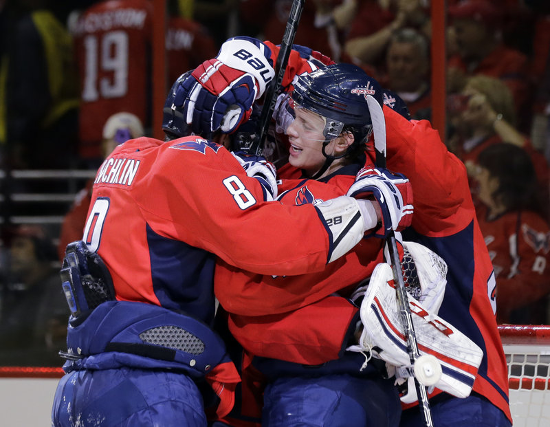 How sweet it is for the Washington Capitals as they celebrate a goal during their 3-1 victory over the New York Rangers in Game 1 of the first-round series.