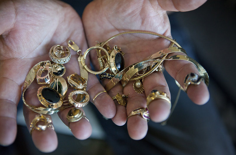 His late mother's gold jewelry would have brought Lou Rosas $3,000 a few months ago. After the Tax Day plunge in gold prices, the biggest one-day drop in 30 years, it's worth about $2,500, and Rosas is reluctant to sell at the lower price.