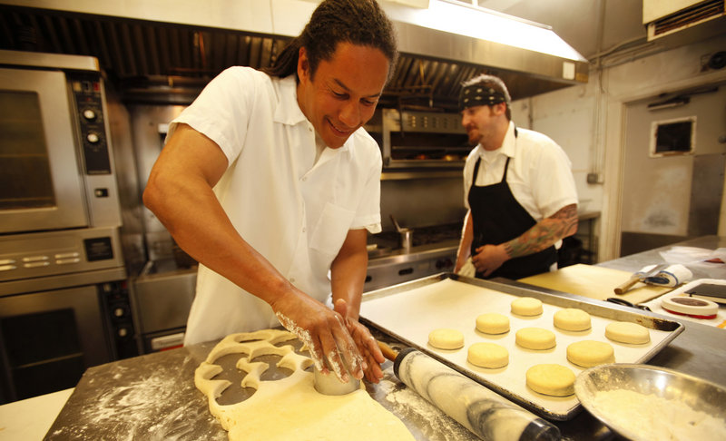 Chef Govind Armstrong, above, makes biscuits at his restaurant Willie Jane in Venice, Calif.