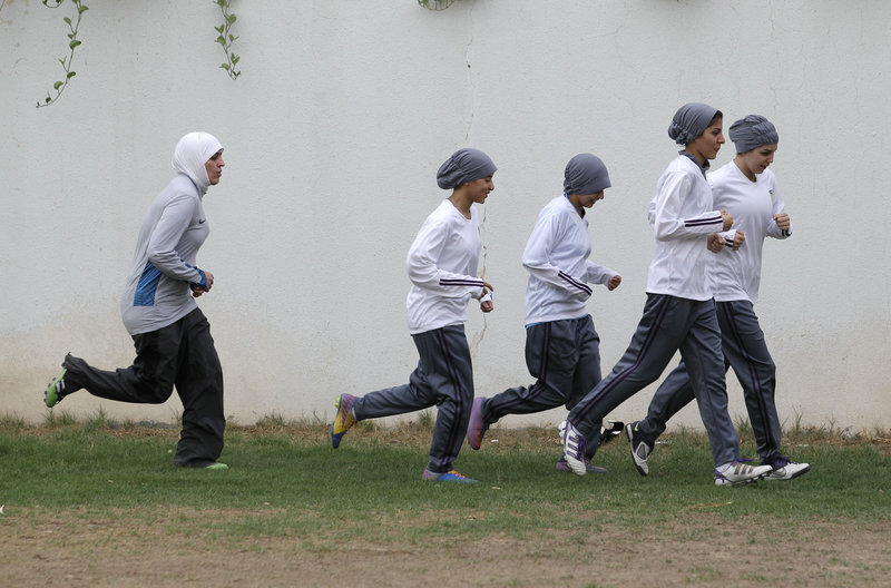 Female soccer team members practice at a secret location in Riyadh, Saudi Arabia. The Education Ministry has allowed private girls’ schools to hold sports activities for students.