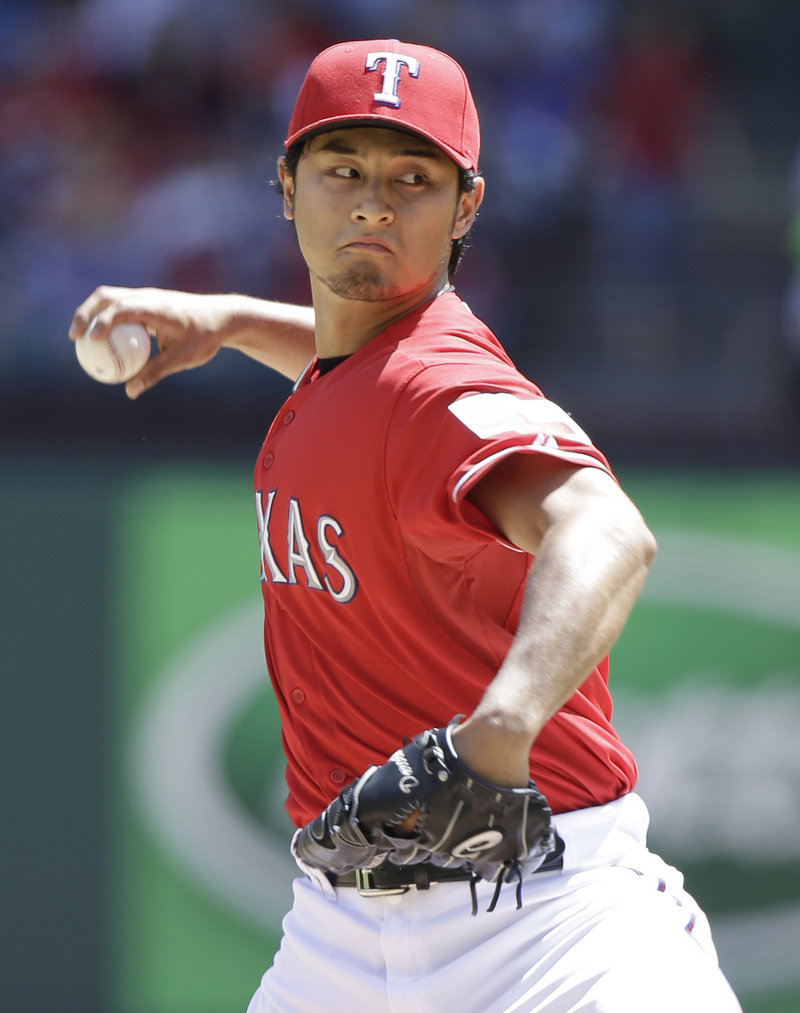 Texas starter Yu Darvish rang up 14 K’s against the Red Sox – the second time he’s done it this year – but also allowed two Boston home runs.
