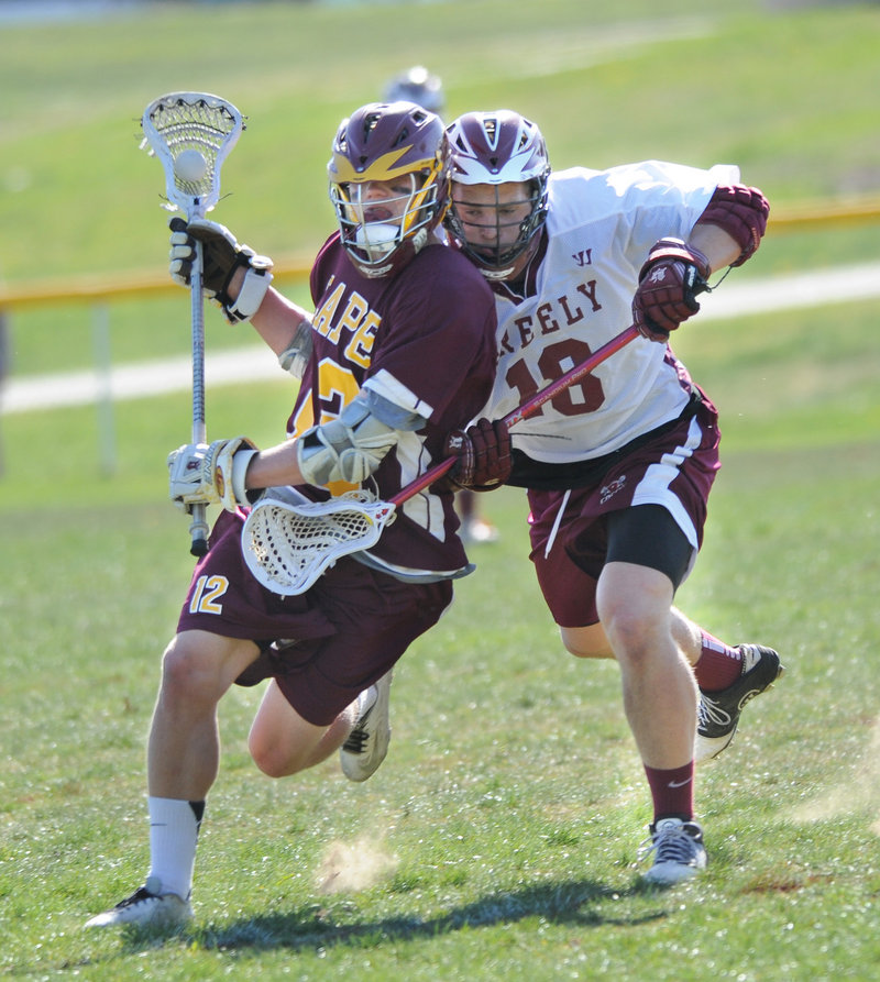 Dylan Rasch of Greely, right, collides with Jack Drinan of Cape Elizabeth during their Western Class B lacrosse game Tuesday. Both teams are 5-1 after Cape Elizabeth came away with an 8-4 victory.