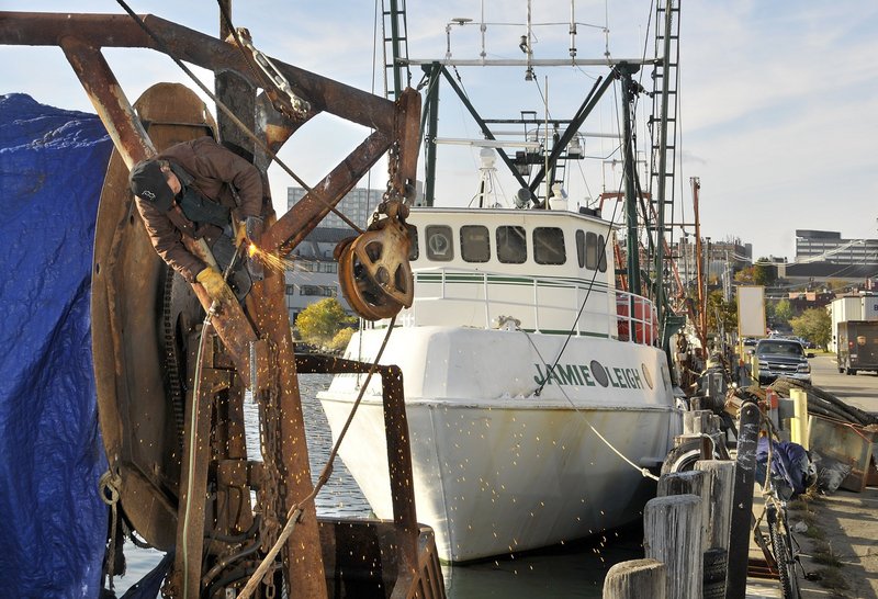 Groundfishing boats like the Lydia & Mayat, left, pictured in 2009, are struggling to stay afloat financially. Some fishermen believe that current federal fisheries regulations are too rigid, while others argue that they are painful but necessary in order for the groundfish industry to survive.