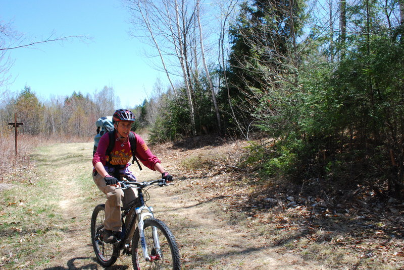 Eastern Maine mountain bike riders are grabbing hold of their destiny, and quite literally, dirt, having cleared a single track in Old Town last weekend on rugged terrain that just so happens to be ideal for adventurous cycling. The project has the blessing of the University of Maine – a significant divergence from the past.