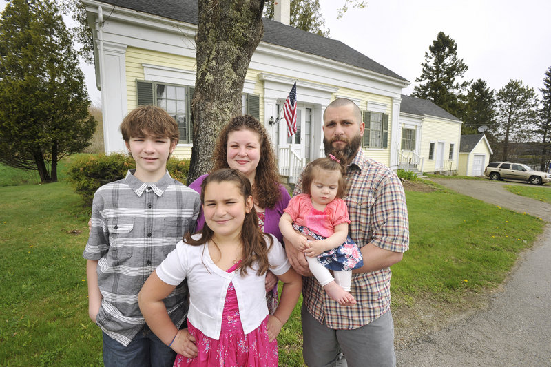 The Evans family, pictured at their home in Searsport, includes, from left, 12-year-old Donald III; 10-year-old Mckenzie; Rosemarie; 14-month-old Willow; and Donald.
