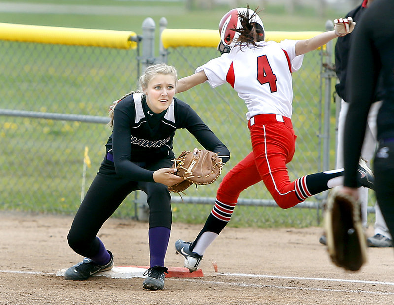 Kelsey Morton of South Portland is late to the bag as Marshwood first baseman Johnna Kashmer takes the throw Friday during Marshwood's 4-3 victory.