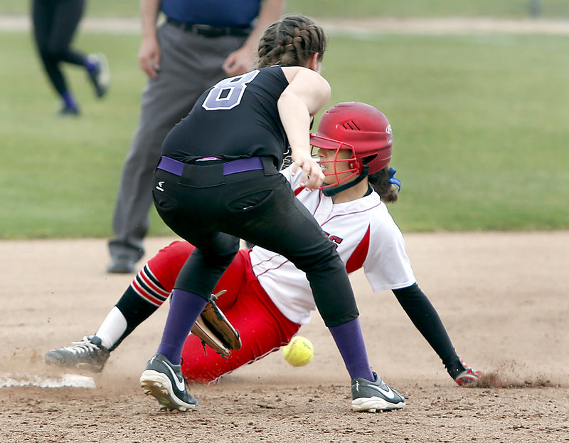 Laurine German of South Portland steals second base as Emily Robida of Marshwood attempts to control the ball.