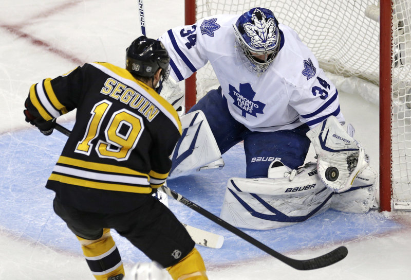 Boston forward Tyler Seguin is foiled by Toronto goaltender James Reimer’s catching glove during first-period action of Friday’s playoff game in Boston, won by the Maple Leafs and setting up Game 6 on Sunday.