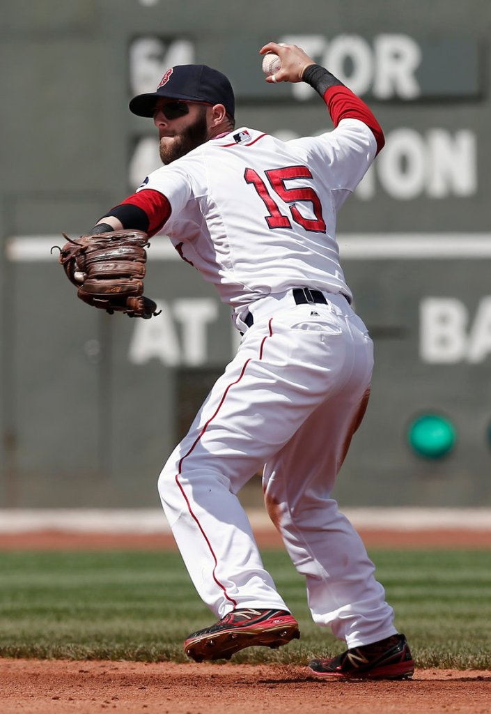 Boston second baseman Dustin Pedroia throws out a runner after fielding a grounder in the second inning.