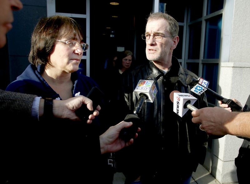 In this Jan. 14, 2013 file photo, Renee Sandora's mother, Patricia Gerber, and her step-father, Mark Gerber, meet with reporters outside the Cumberland County Courthouse after Joel Hayden was found guilty of killing Sandora, the mother of his four children.