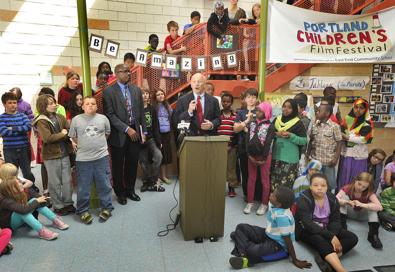 Portland School Superintendent Emmanuel Caulk, left, joins with Mayor Michael Brennan to encourage voters to approve the school budget in Tuesday’s referendum. They held a news conference at the East End School on Munjoy Hill, with students on hand to watch.