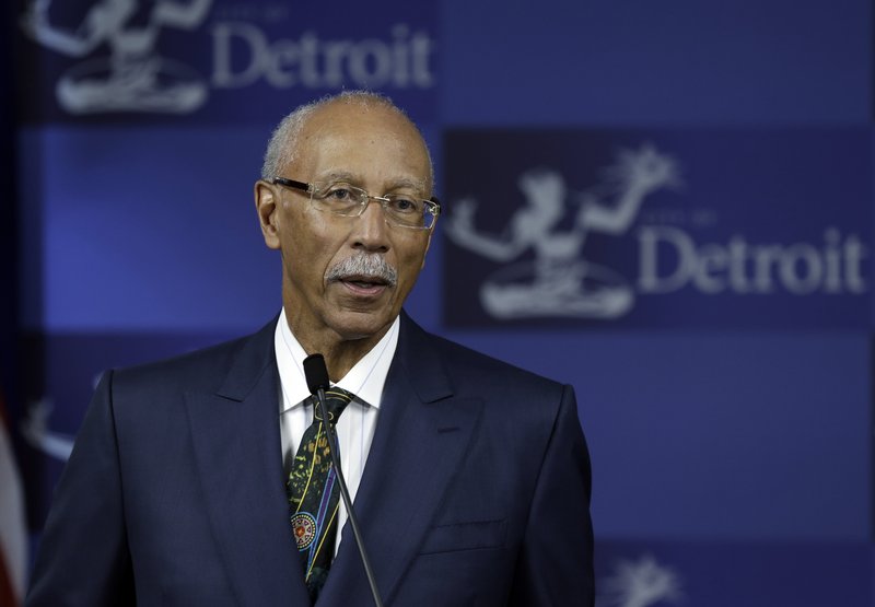 Detroit Mayor Dave Bing discusses the city’s finances during a news conference. An emergency manager’s report says city operations are “dysfunctional and wasteful.”