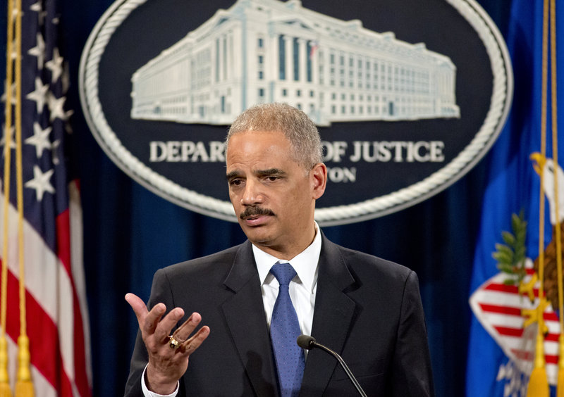 Attorney General Eric Holder is questioned at a news conference Tuesday about the Justice Department’s gathering of phone records from the Associated Press.