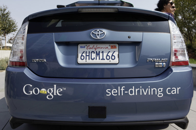 A driverless car is displayed at Google headquarters in Mountain View, Calif. Fully autonomous models are less than a decade from dealerships, and someday we could be debating whether people should be allowed to drive at all.
