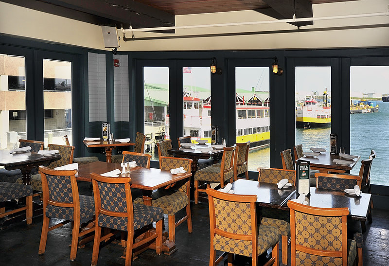 The upstairs dining room at RiRa overlooks Portland Harbor and the fleet of ferries operated by Casco Bay Lines.