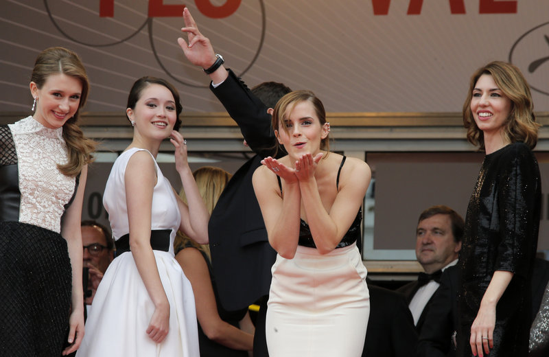 Emma Watson blows kisses at the 66th annual Cannes Film Festival, in Cannes, France, Thursday.