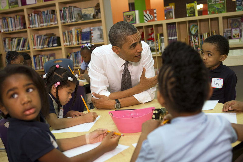 President Obama talks to a class of pre-kindergarten schoolchildren at Moravia Park Elementary School in Baltimore, Md., on Friday during the his second “Middle Class Jobs and Opportunity Tour.”