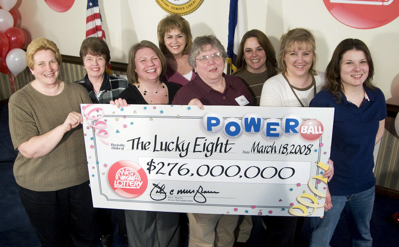 Eight co-workers in the Monongalia County Tax Office claim their $276 million Powerball prize in Charleston, W.Va., in 2008. Workplace pools for big jackpots are often fraught with controversy, resulting in lawsuits, broken friendships and delayed payouts.