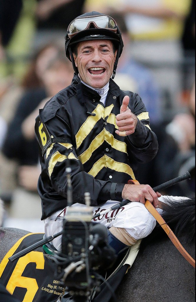 Jockey Gary Stevens, who came out of retirement in January, gives a thumbs-up after winning the 138th Preakness Stakes at Baltimore’s Pimlico Race Course on Saturday.