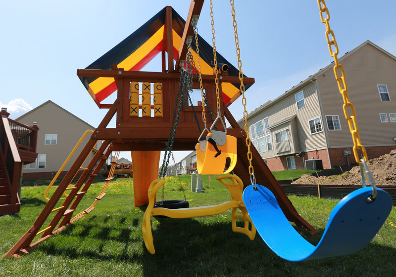 A play set called “The Carnival” graces a backyard in Novi, Mich. Before selecting a design online or from a catalog, “You’ve got to come into the showroom and let the kids test it out,” says Dave Byrum of Kids Gotta Play.