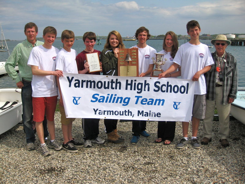 Yarmouth High’s sailing team won the Downeast Championship and Maine Schools Championship this past weekend at Maine Maritime Academy. Pictured from left to right: assistant coach Doug Baker, co-captain Sam Alexander, Ethan Merrill, Ben Palmer, Anna Bernard, co-captain Tim Morse, Haley Estabrook, Teo Scott, and head coach Mike Horn. Absent from photo: Kaeleigh Morton.