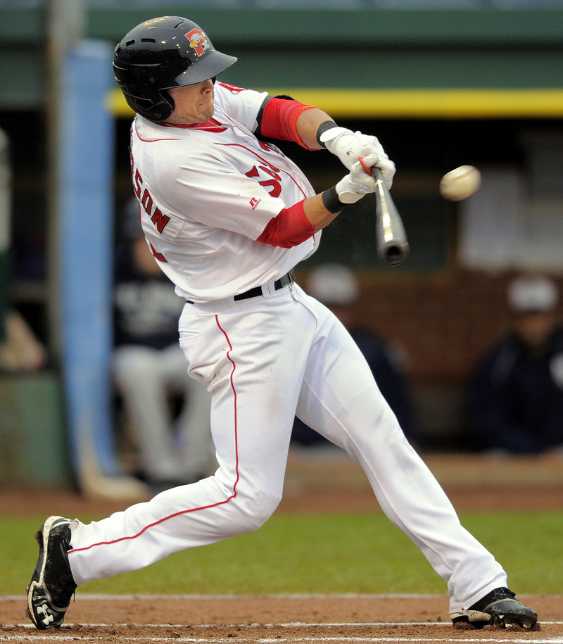 Portland’s Shannon Wilkerson rips a leadoff double against the Manchester Fisher Cats on Tuesday at Hadlock Field. The Sea Dogs went on to win, 5-3.