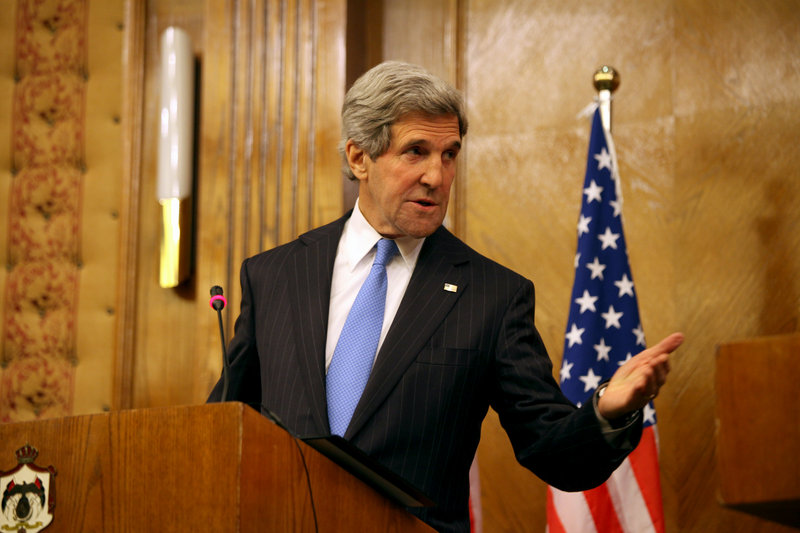 Secretary of State John Kerry speaks in Amman on Wednesday. Kerry said the United States and its allies will step up their support for Syria’s opposition.