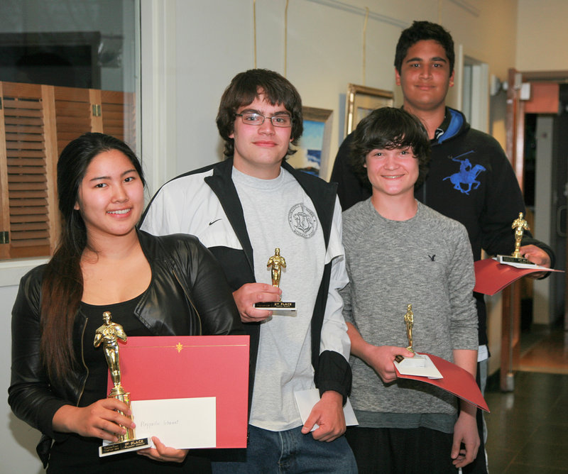 Teen2Teen VidFest top four winners pose after receiving their awards during a special screening night of their short public service announcement films. Pictured from left are Ploypailin Intarawut, Nathan Austin, Aidan Shadis and Sammy Zaidi.
