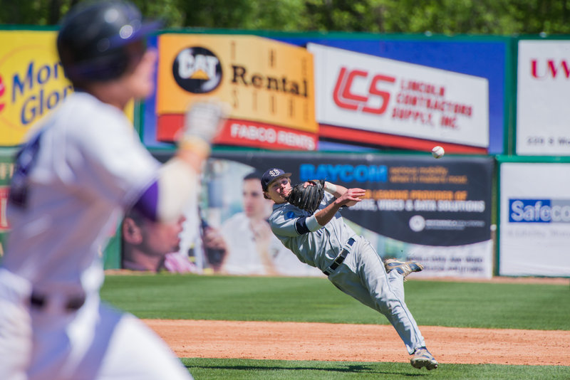 Southern Maine shortstop Sam Dexter gets his body into the throw and gets the Millsaps runner at first base for the first out of the fifth inning.