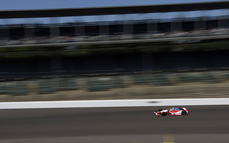 Justin Wilson of England heads into the first turn during the final practice session Friday for the Indianapolis 500 auto race at the Indianapolis Motor Speedway on Sunday, where his competitors will include the hometown favorite, Ed Carpenter.
