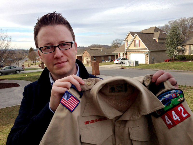 Wes Comer holds the Boy Scout uniform of his son, Isaiah, in Knoxville, Tenn. Comer, whose family attends an Apostolic Pentecostal church which considers homosexuality sinful, had been wrestling with whether to pull his eldest son out of the Scouts if the no-gays policy was abandoned.