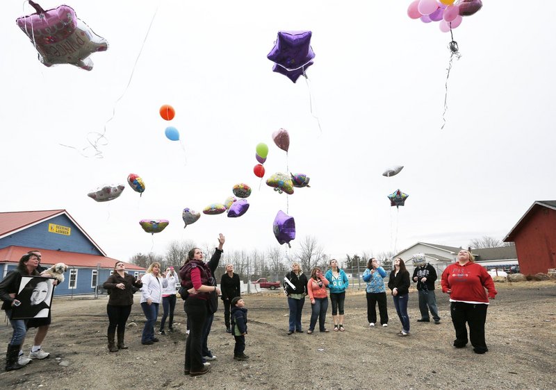 Family members and friends of Haley Plaisted release balloons on her 17th birthday, three days after her suicide last month, near a friend’s house in Springvale. Loved ones are still struggling to find answers for why she chose to end her life.