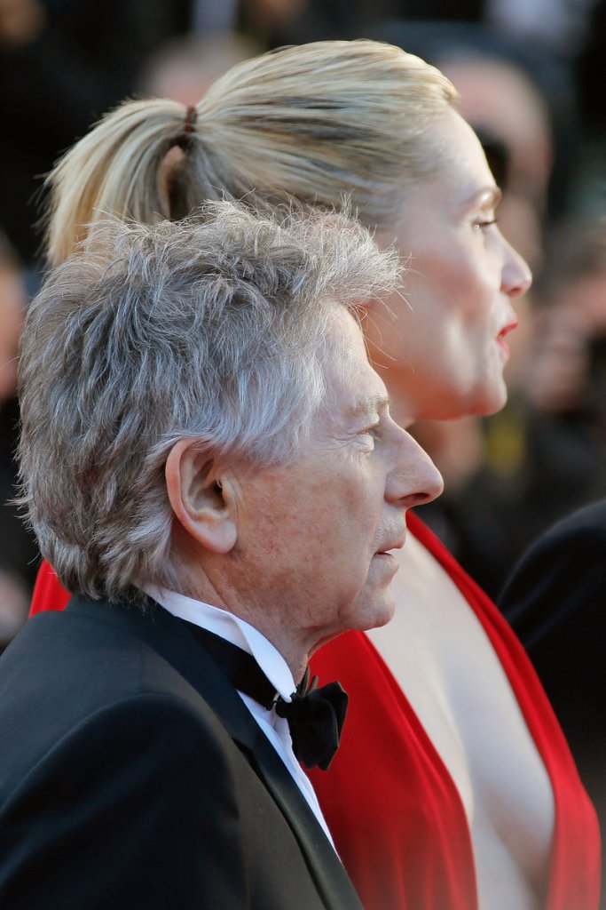 Director Roman Polanski and his wife, actress Emmanuelle Seigner, arrive at Cannes, France.