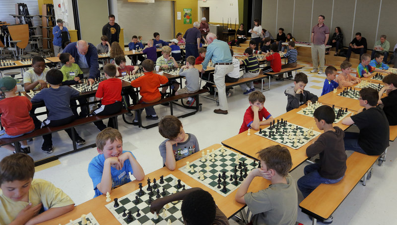 Students from East End Community School, Falmouth Elementary School and Ocean Avenue Elementary School, packed into the East End School cafeteria Wednesday, May 29, 2013, for the school's inaugural chess tournament.