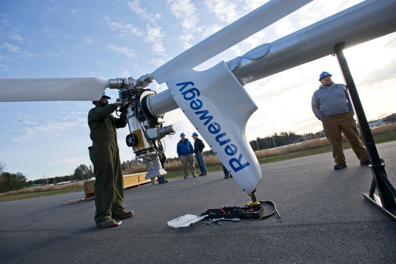 In this April 2013 file photo, a team from the University of Maine at Orono test a turbine outside of their laboratory at UMO. Hundreds of people are expected on the banks of the Penobscot River in Brewer on Friday morning to see and celebrate history in the making, as North America's first floating offshore wind turbine is lowered into the water.