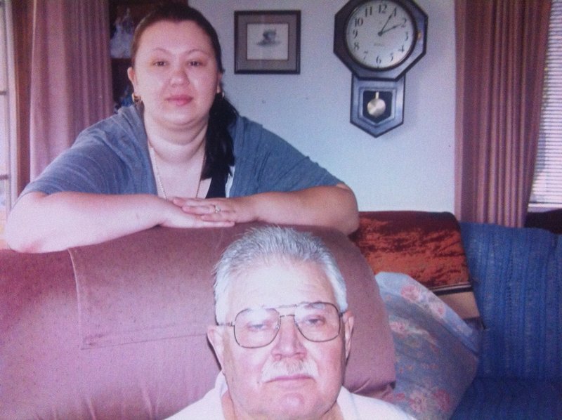 Nicole Lynn Mansfield stands behind her grandfather Monte Mansfield in this 2007 photo provided by the Mansfield family.