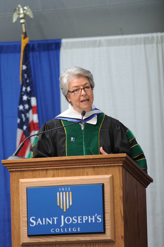 Anna Eleanor Roosevelt, president and CEO of Goodwill Industries of Northern New England, addresses the Class of 2013 at Saint Joseph’s College’s 100th commencement Saturday.    Photo credit: Fred Field