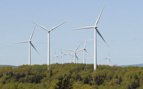 In this May, 2010 photo, wind turbines tower over the landscape at the Steston wind farm in Danforth.