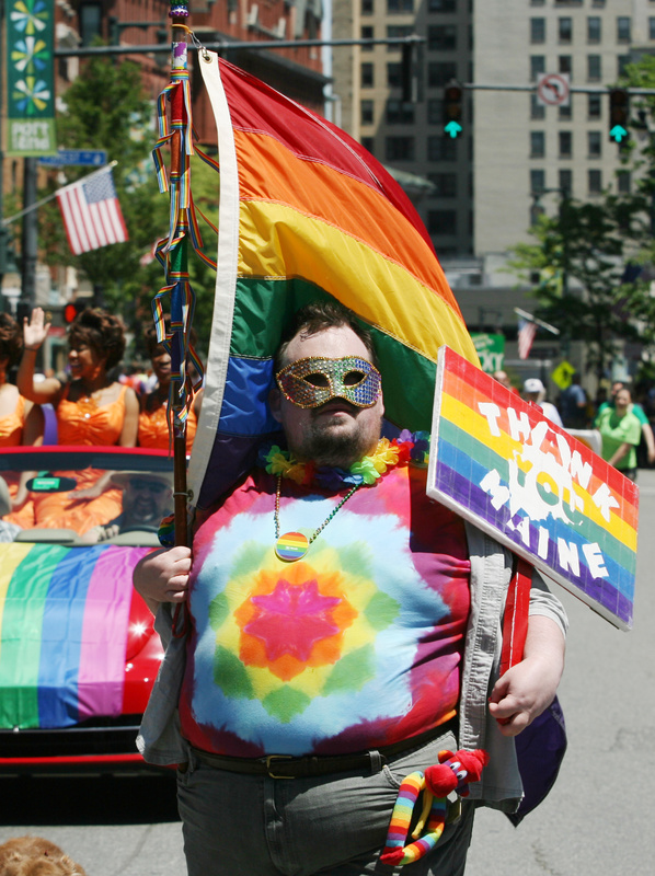 John Paschal, of Sanford, marches Saturday during the annual Pride Parade in Portland.