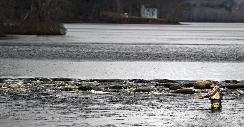 In this April 2012 file photo, Mike Gundel of Rockland fishes the St. George's River in Appleton for trout. Volunteer anglers are being sought to survey remote ponds and lakes around Maine in search of brook trout.