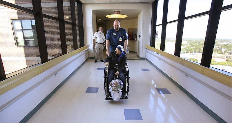In this September 2012 file photo, a patient is wheeled out of Barbara Bush Children's Hospital at Maine Medical Center in Portland. 