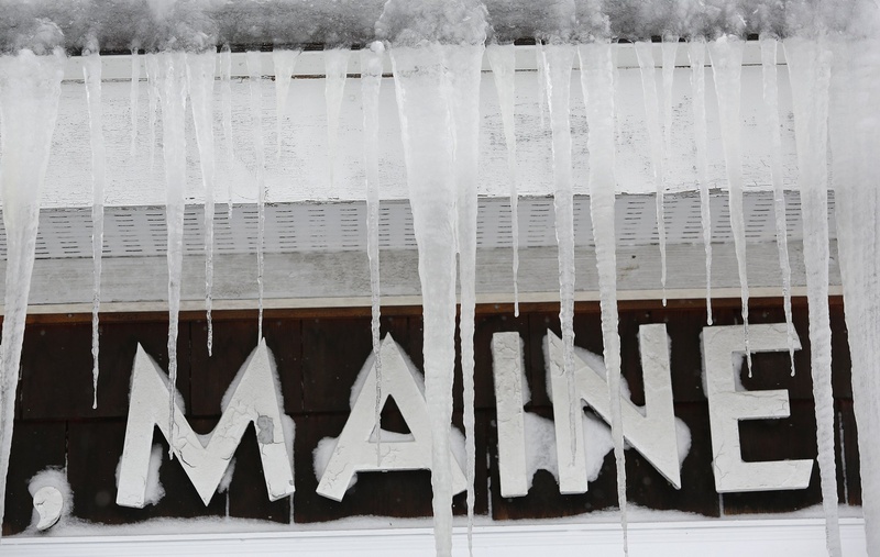 Icicles cover a sign at the Scarborough Post Office on Feb. 9 after a storm buried the area in snow. The federal government is providing $1.5 million in aid to help pay costs associated with the storm.