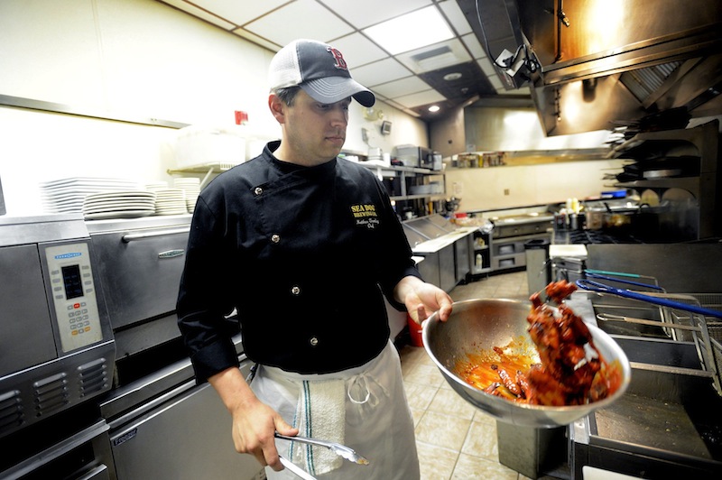 Chef Matthew Tremblay makes his BBQ wings at Sea Dogs Brewing Co. in South Portland Thursday, June 6, 2012. Tremblay will compete in the 2nd Annual Maine Hot Wing Cook-Off Challenge on Saturday, June 22.