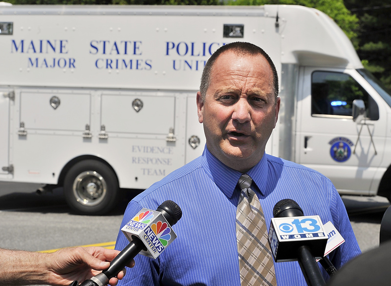 Maine State Police Sgt. Chris Harriman updates the media after a family member found a father and son dead in an apparent murder-suicide in Freeport on Tuesday.