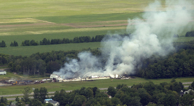 Smoke billows from the B.E.M fireworks factory in Coteau du Lac, Quebec, on Thursday following an explosion. Canada;Quebec;Montreal;BEM;Fireworks;fire;explosion;danger