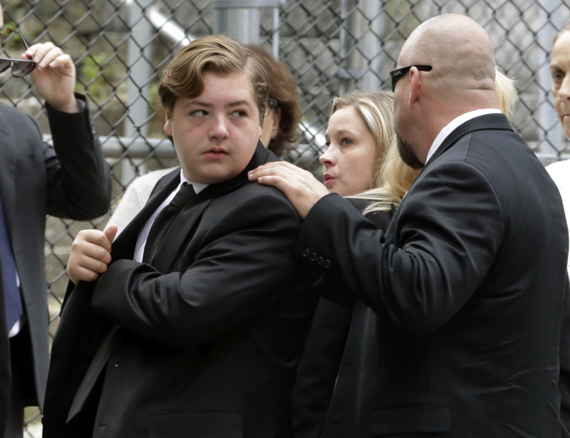 Michael Gandolfini, left, son of James Gandolfini, arrives for the funeral service of his father at the Cathedral Church of Saint John the Divine on Thursday.