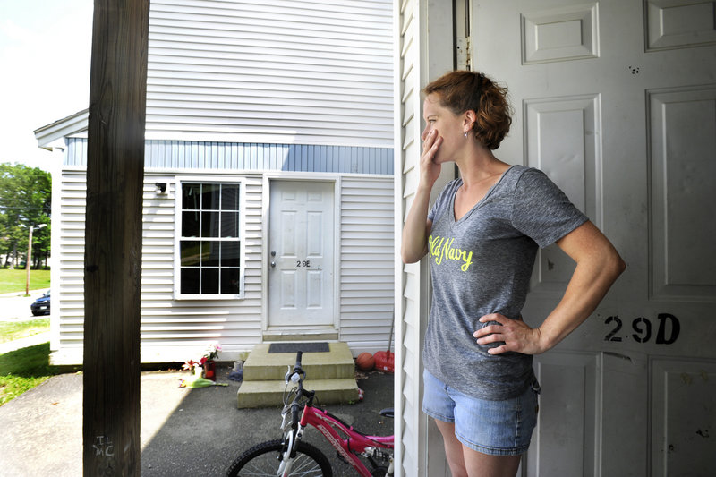 Erika Hart of Bath, Maine comments on her neighbors, whose 9-month-old baby on Monday.