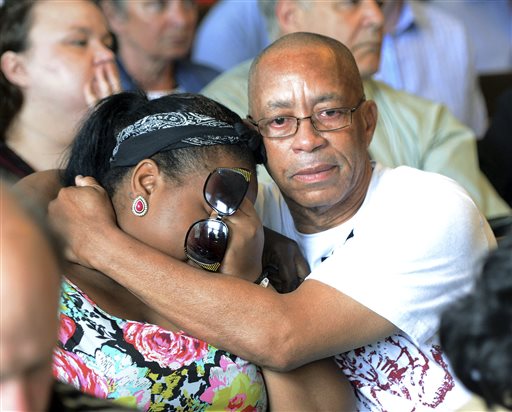 Family of Odin Lloyd react during the arraignment of former New England Patriots tight end Aaron Hernandez in Attleboro District Court Wednesday, June 26, in Attleboro, Mass.